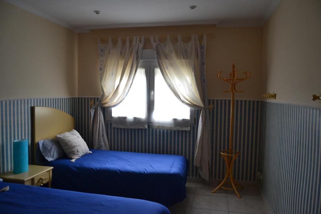 Postel nebo postele na pokoji v ubytování La Gala