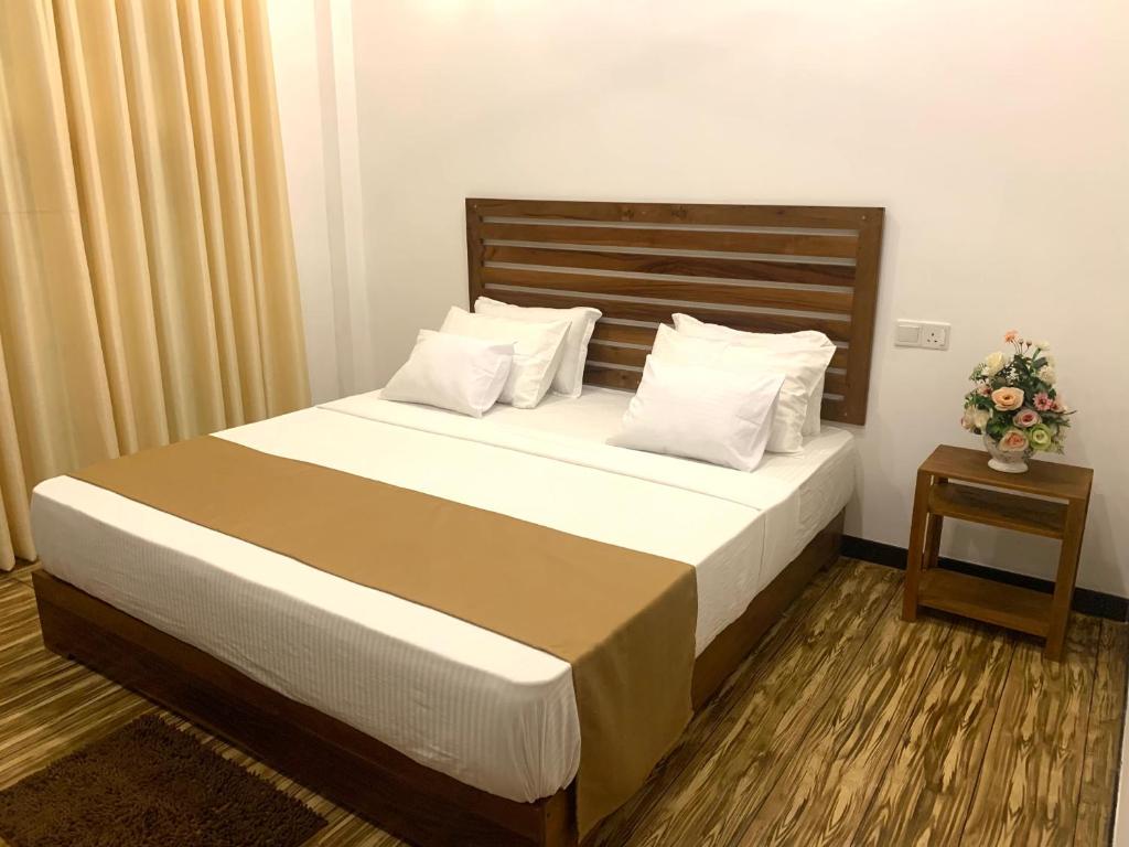 Postel nebo postele na pokoji v ubytování Imperial Resort