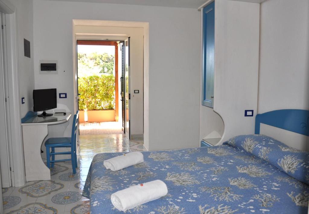 Postel nebo postele na pokoji v ubytování Villa Myremi