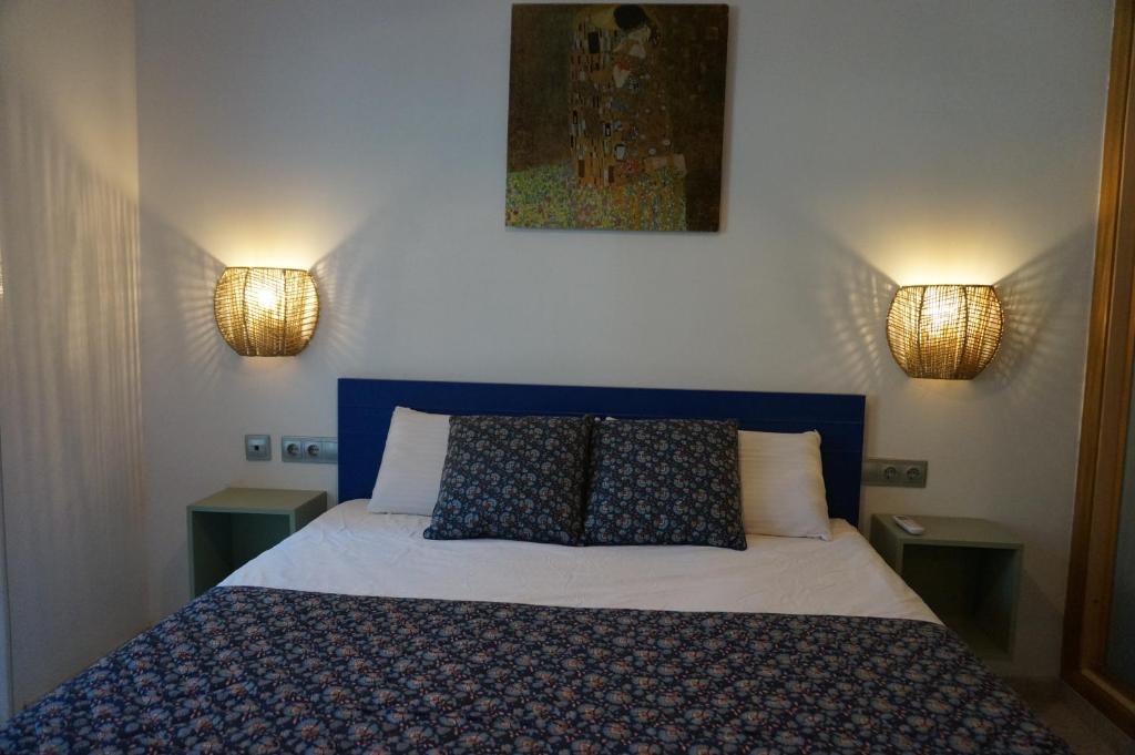 Posteľ alebo postele v izbe v ubytovaní Pineda Sunset Beach Seaviews