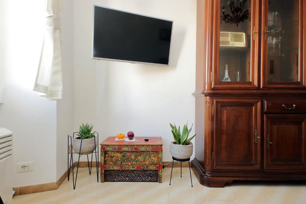 Telewizja i/lub zestaw kina domowego w obiekcie Casa Rossi Roma