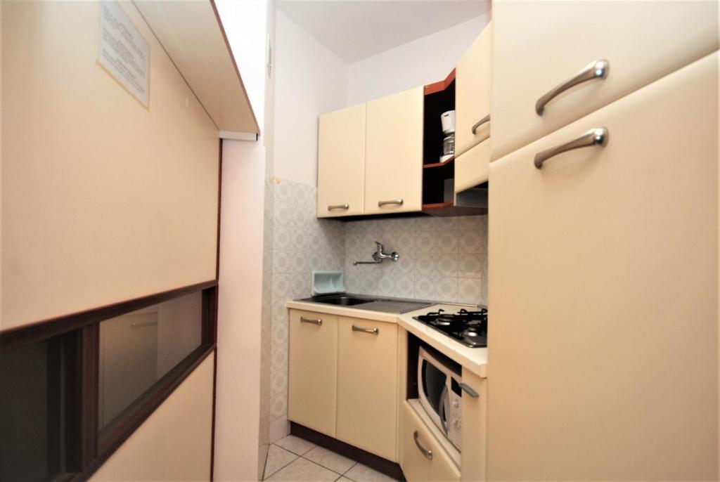 Kuchyň nebo kuchyňský kout v ubytování Residenza Bianco Nero