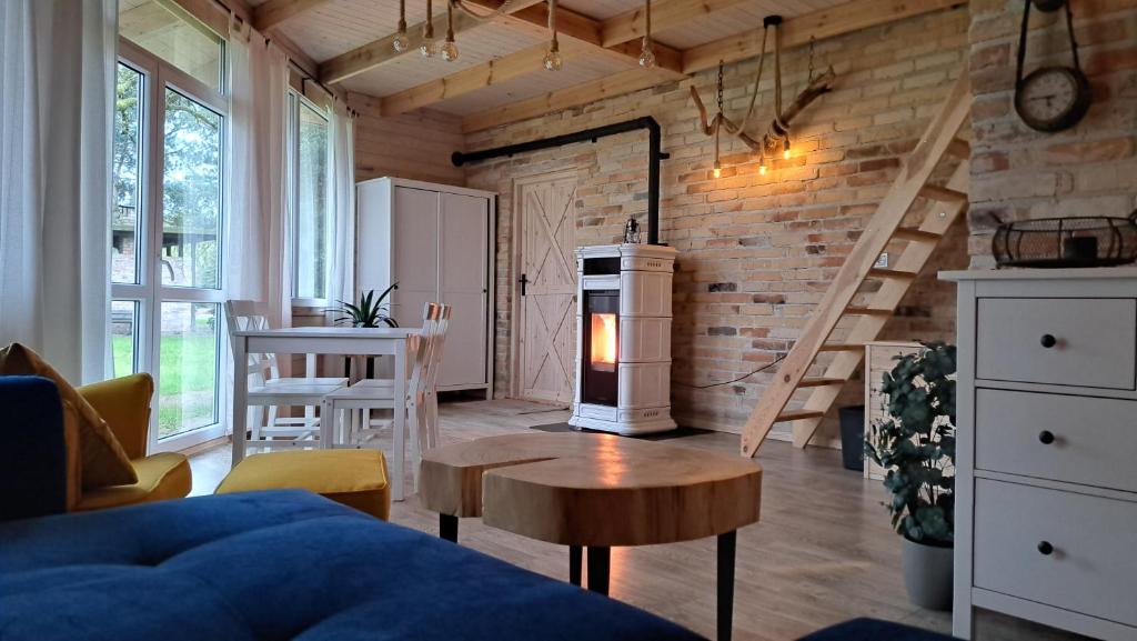 Posezení v ubytování Domek Leśny bungalow, apartament typu studio