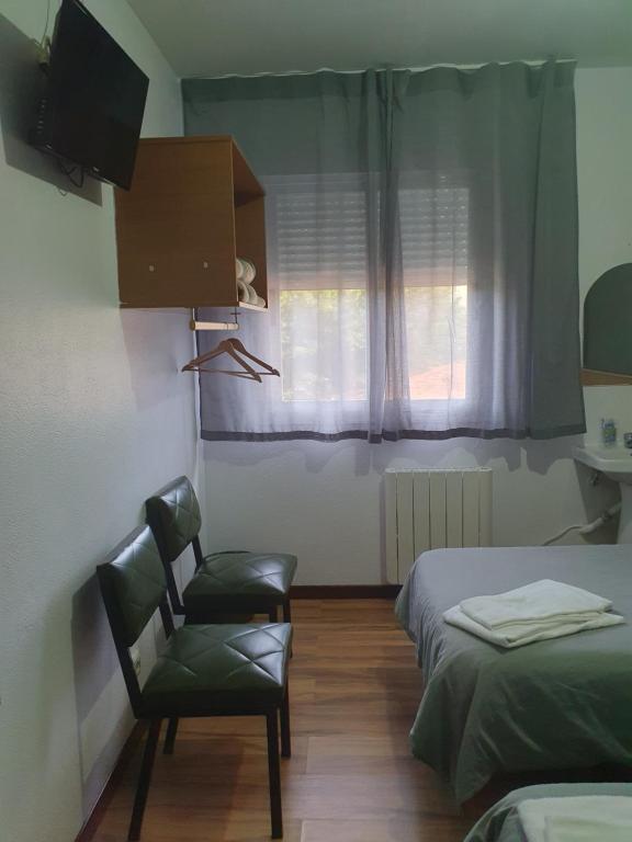 Postel nebo postele na pokoji v ubytování A Concha