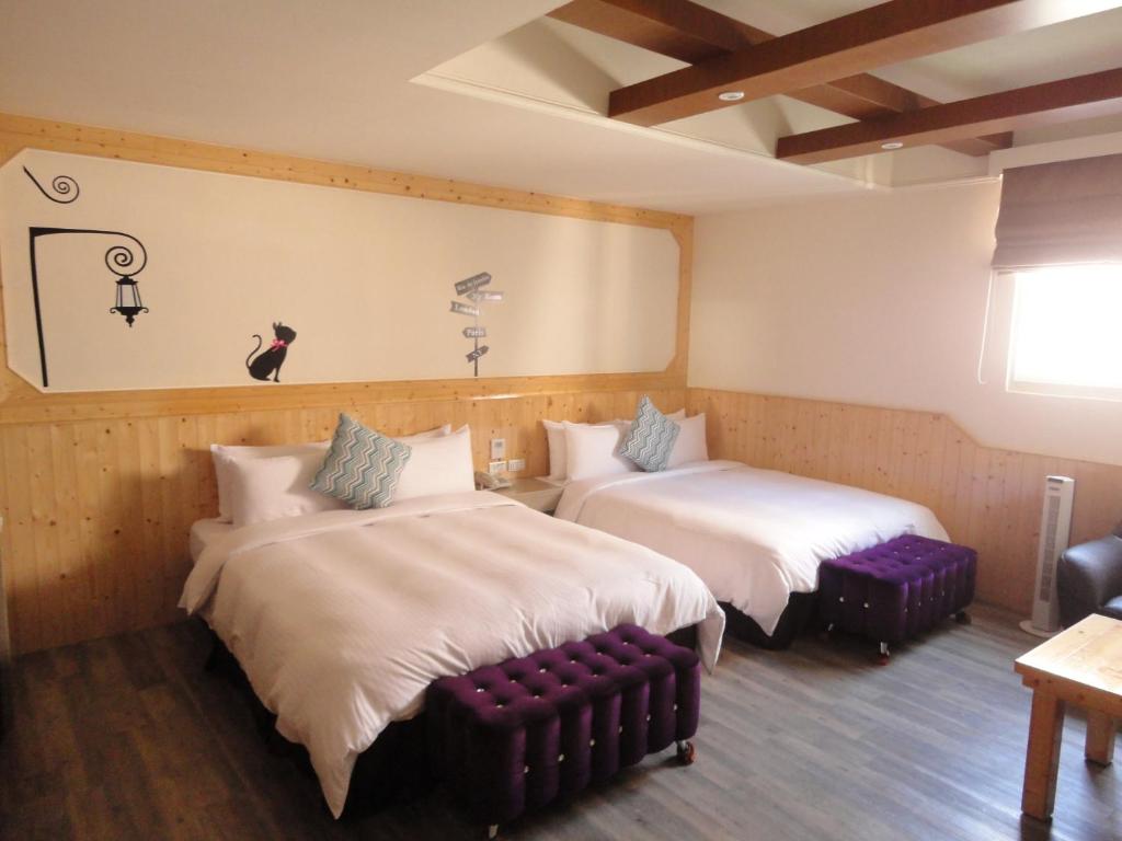 Postel nebo postele na pokoji v ubytování Royal Hotel
