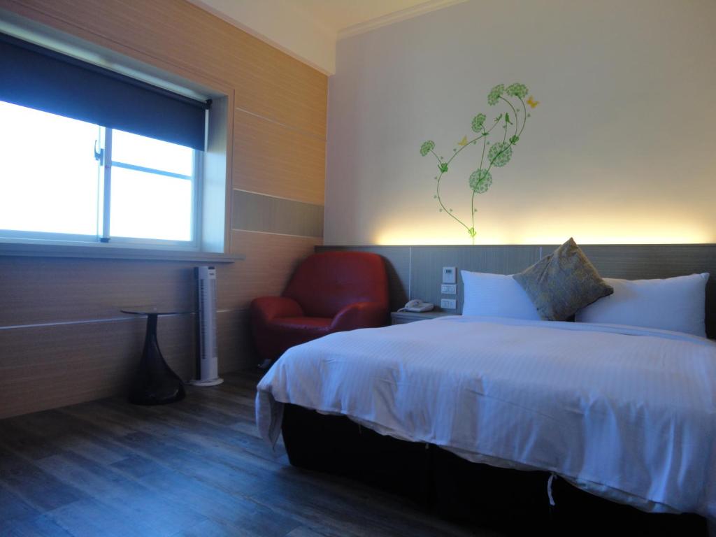 Postel nebo postele na pokoji v ubytování Royal Hotel