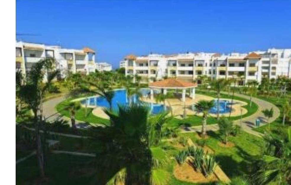 a view of a resort with a swimming pool at Chez Nina in Asilah