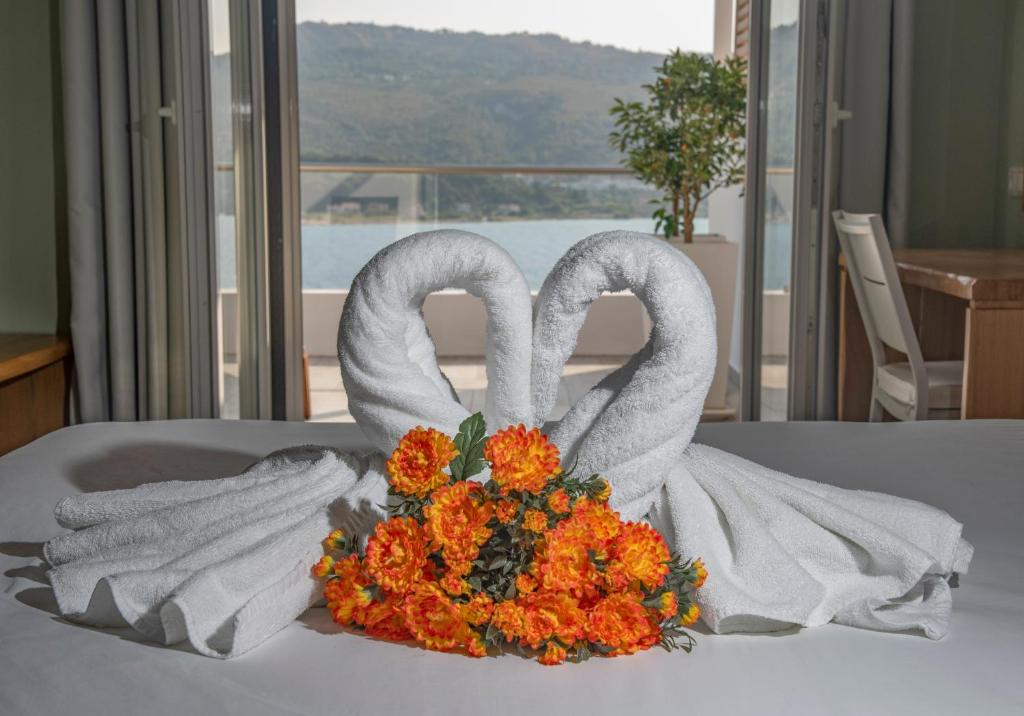 Postel nebo postele na pokoji v ubytování Anthemis Hotel Apartments
