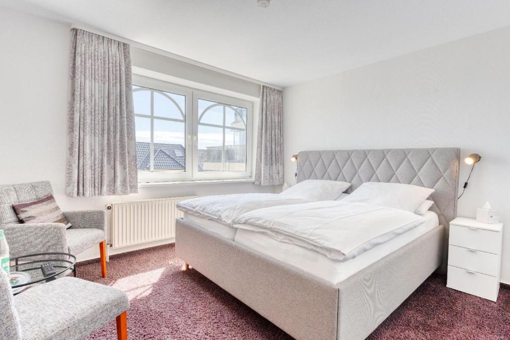 Postel nebo postele na pokoji v ubytování Strandvilla an der Kaiserwiese
