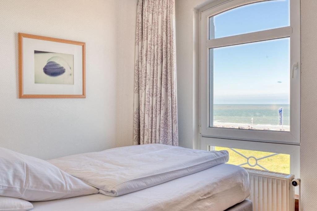 Postel nebo postele na pokoji v ubytování Strandvilla an der Kaiserwiese