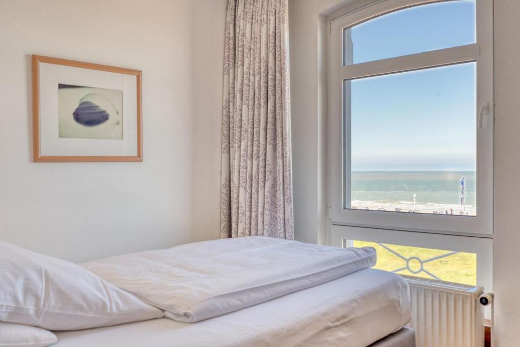 Postel nebo postele na pokoji v ubytování Strandvilla an der Kaiserwiese