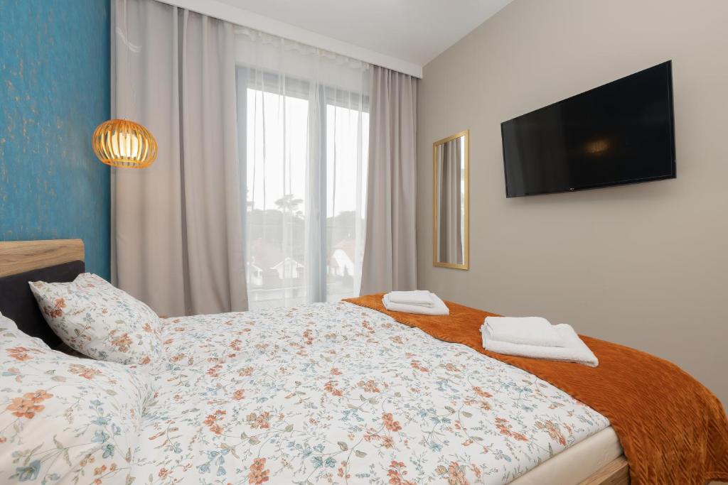 Łóżko lub łóżka w pokoju w obiekcie Sea&Sky View Apartment Par La Mer