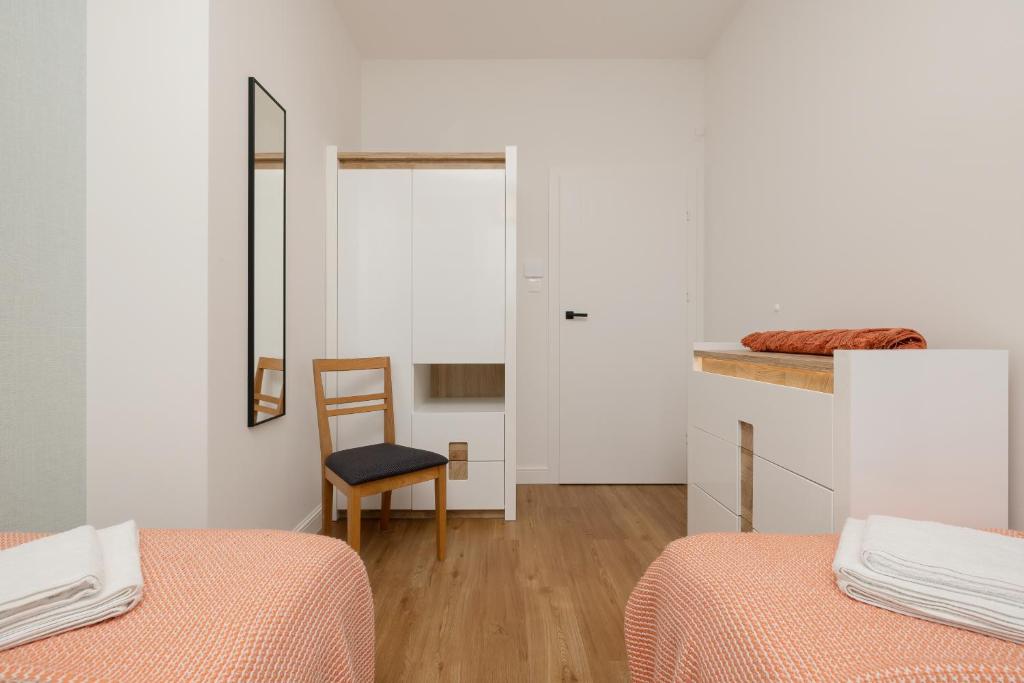 Łóżko lub łóżka w pokoju w obiekcie Sea&Sky View Apartment Par La Mer