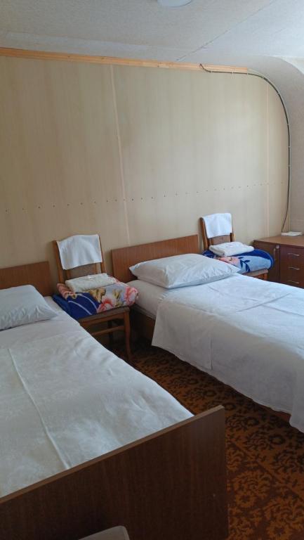 Postel nebo postele na pokoji v ubytování Arman Guest House