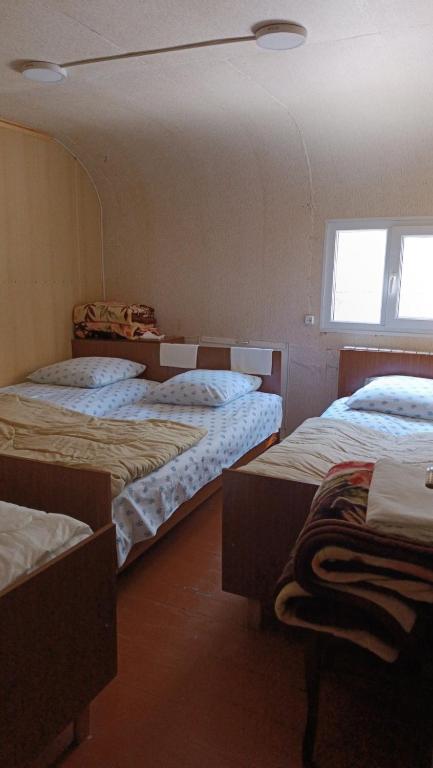 Postel nebo postele na pokoji v ubytování Arman Guest House