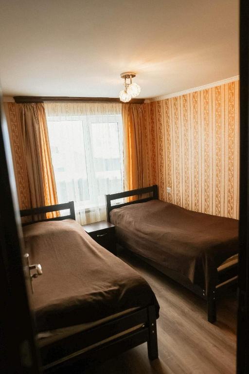 Postel nebo postele na pokoji v ubytování Arsenas Guest House