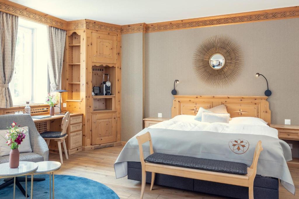 Postel nebo postele na pokoji v ubytování Parkhotel Margna Superior
