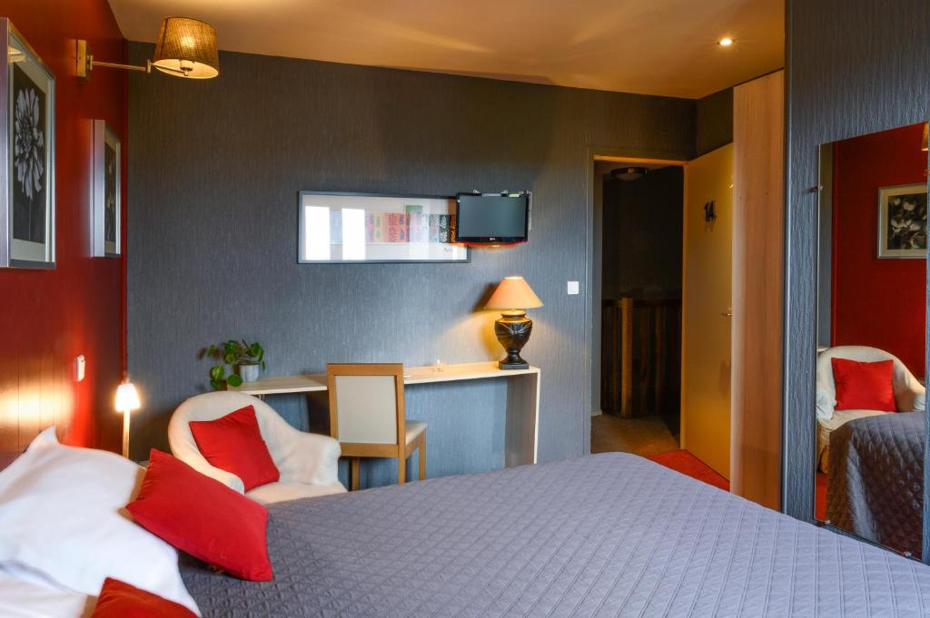 Postel nebo postele na pokoji v ubytování Hotel La Chope