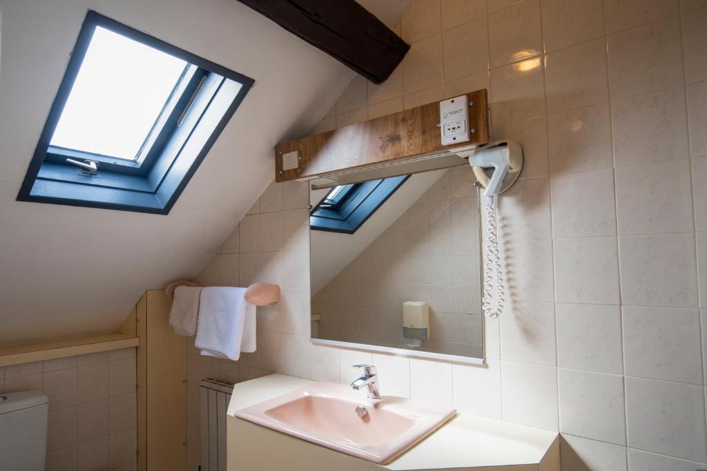 Koupelna v ubytování Hotel La Chope