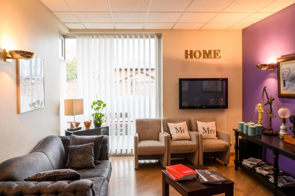 TV a/nebo společenská místnost v ubytování Hotel La Chope