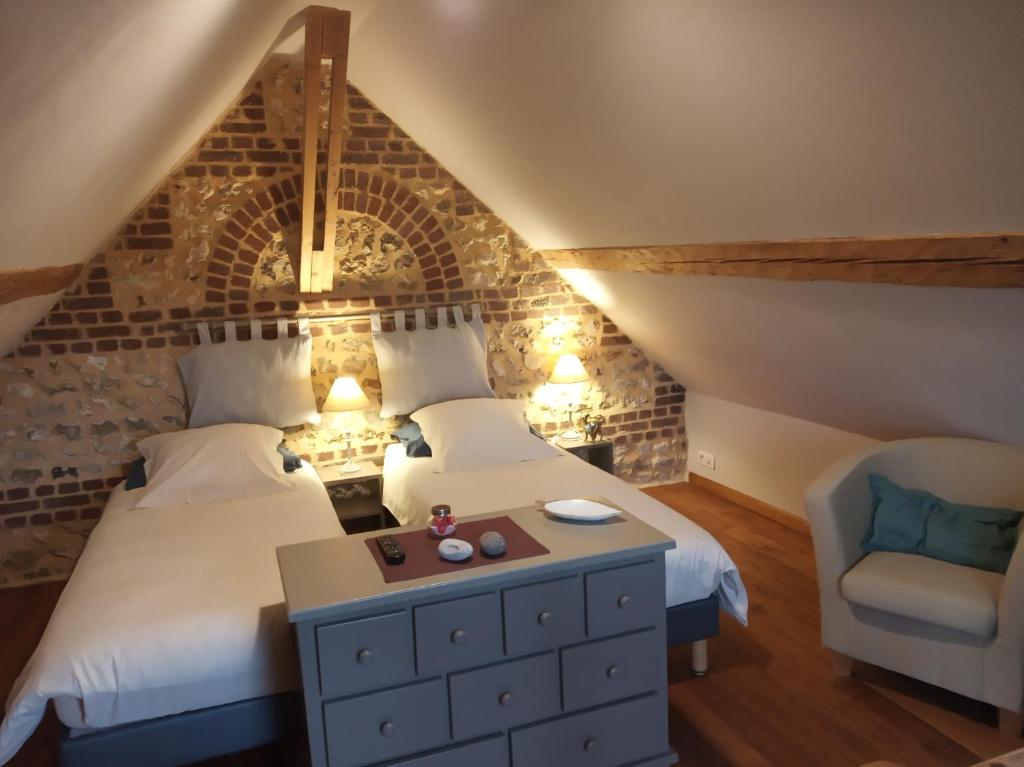Posteľ alebo postele v izbe v ubytovaní Eco-gîte La chambre du Vanneur
