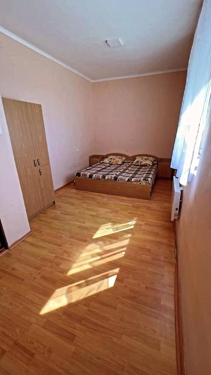 Postel nebo postele na pokoji v ubytování Лісова Дача