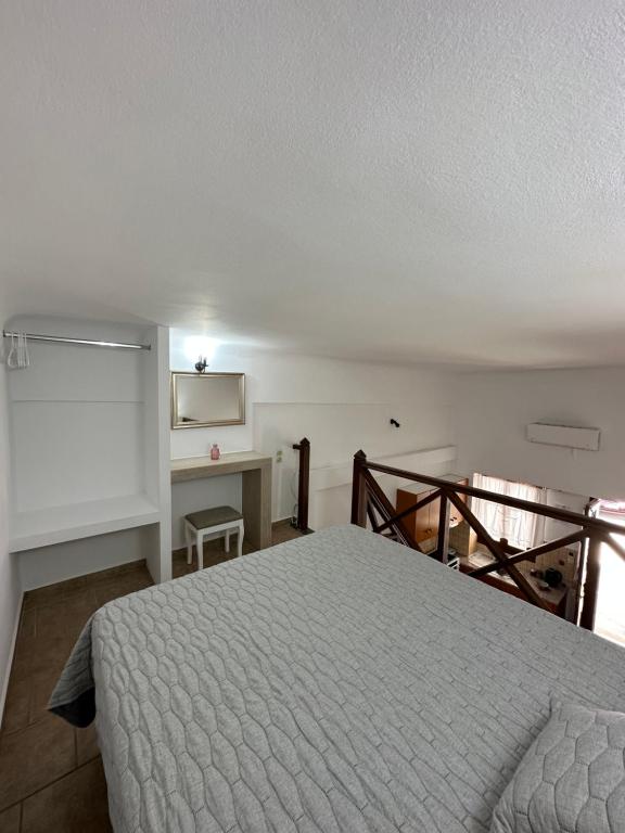 Postel nebo postele na pokoji v ubytování Ano Syros Vibes