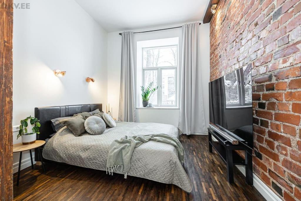 Postel nebo postele na pokoji v ubytování Stylish apartment