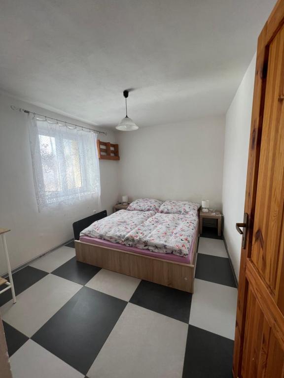 Postel nebo postele na pokoji v ubytování Ubytování U Tří Sluníček Staňkov