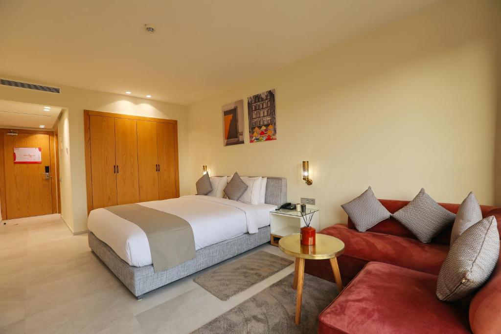 Postel nebo postele na pokoji v ubytování Ari Boutique Hôtel - Adult Only