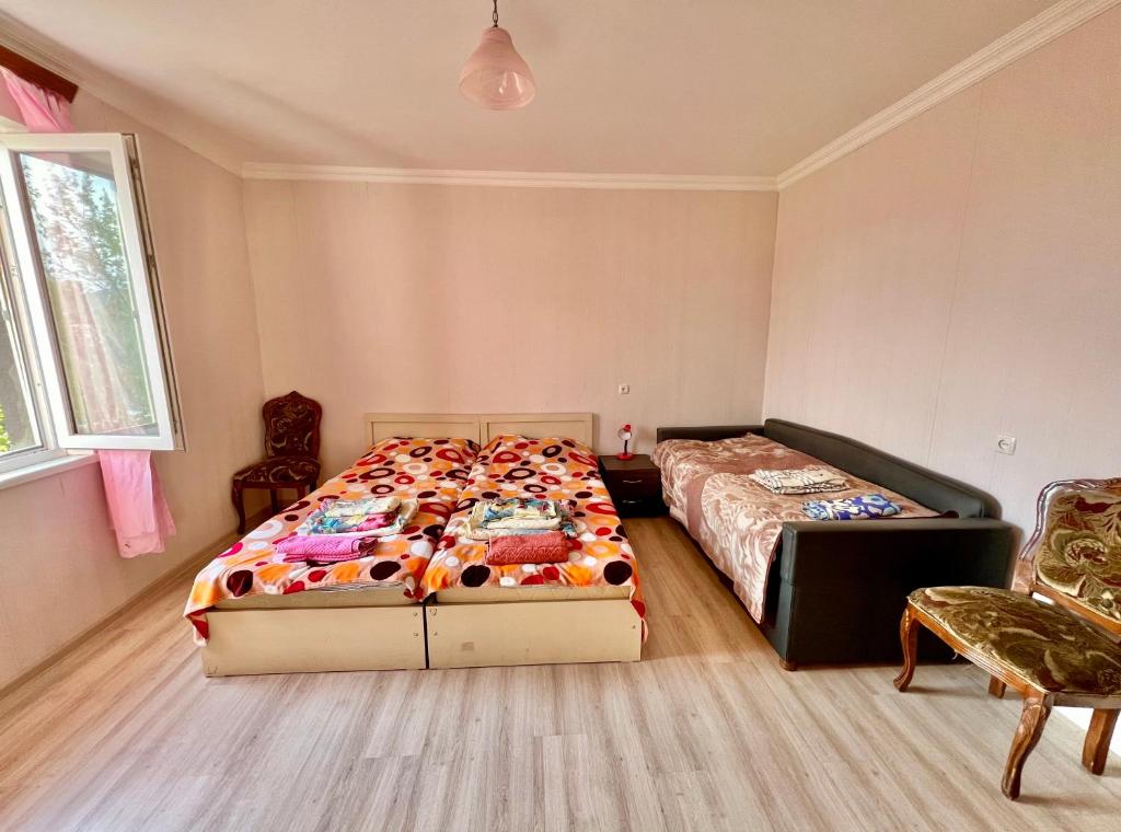 Postel nebo postele na pokoji v ubytování My home udabno