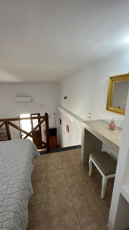 Postel nebo postele na pokoji v ubytování Ano Syros Vibes
