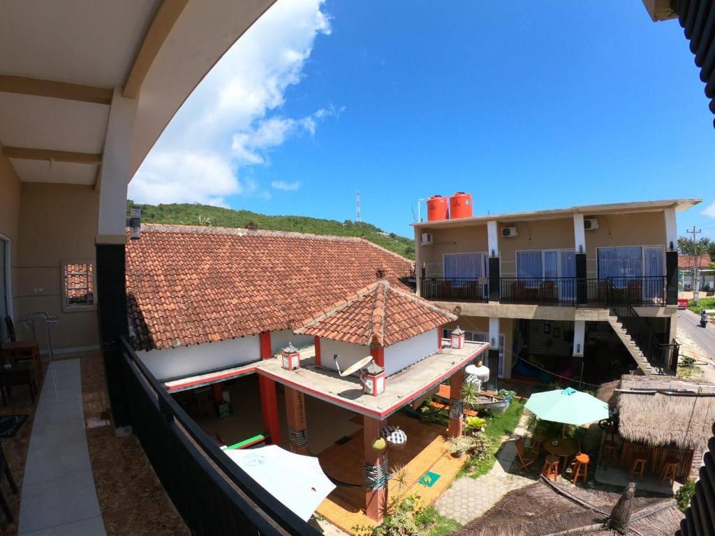 an overhead view of a building with a roof at Sama sama Karimunjawa in Karimunjawa