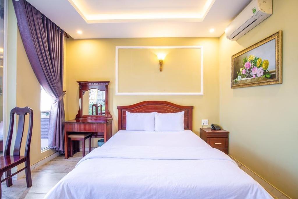 Postel nebo postele na pokoji v ubytování Sea Memory Hotel