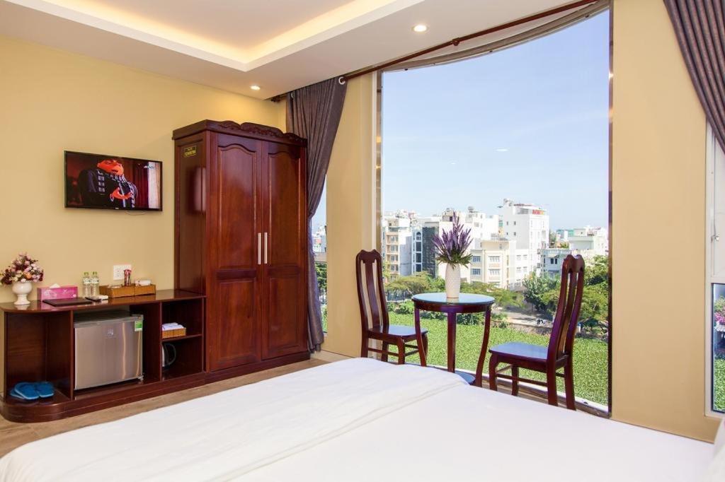 Postel nebo postele na pokoji v ubytování Sea Memory Hotel