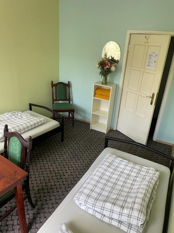 Postel nebo postele na pokoji v ubytování Mikalo House