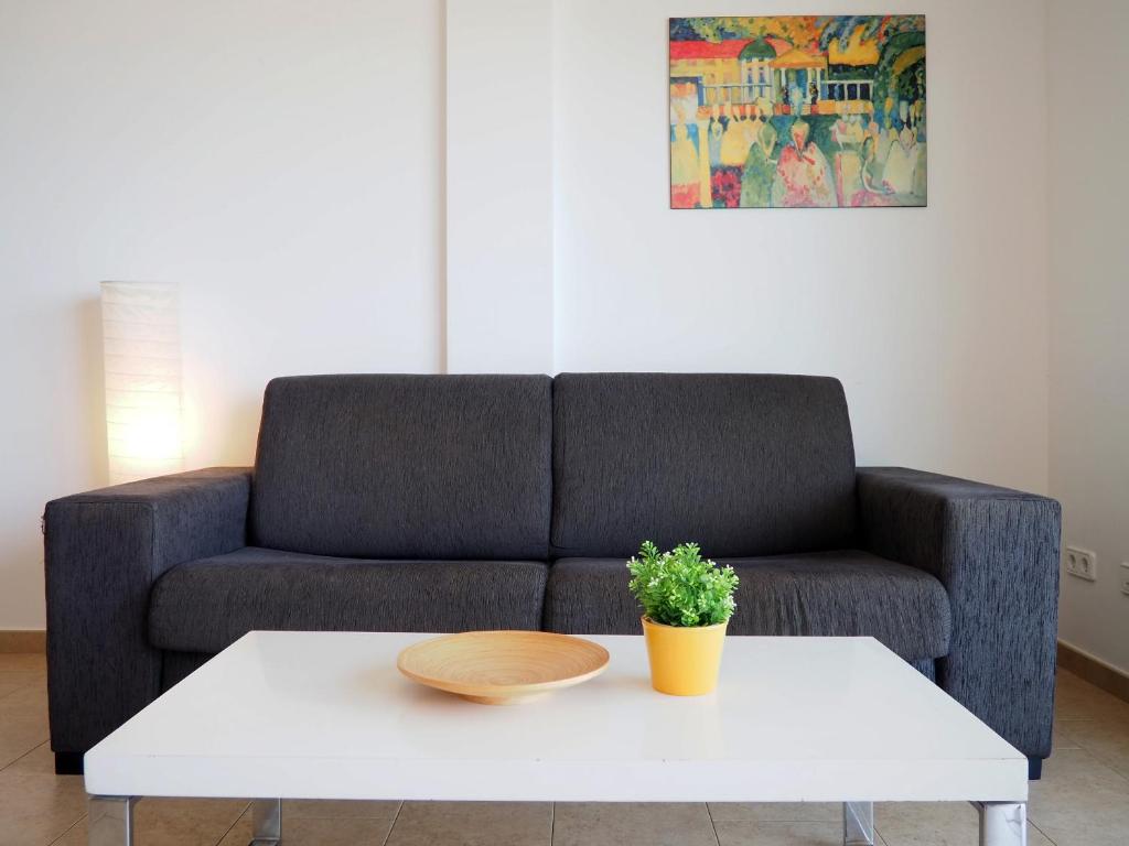 Posedenie v ubytovaní Apartamento Univers