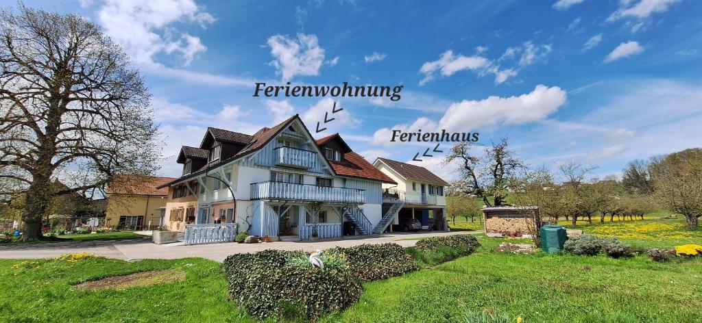 a house with the words farm nourishing and fertilizers at Sitter-Panorama in Bischofszell