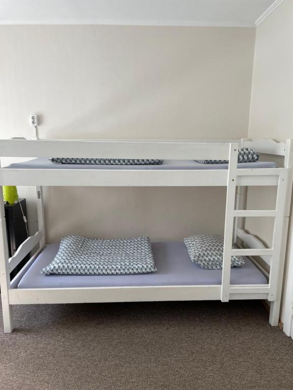 Postel nebo postele na pokoji v ubytování Mikalo House