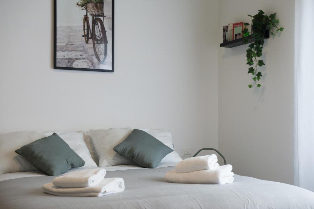Postel nebo postele na pokoji v ubytování Le Terrazze del Duca San Pietro Guesthouse