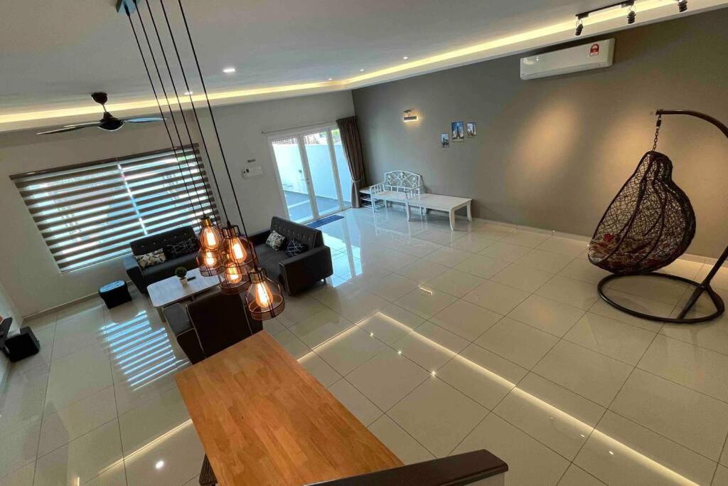 a large living room with a couch and a table at The White House Near Heritage Jonker Malacca Town in Melaka