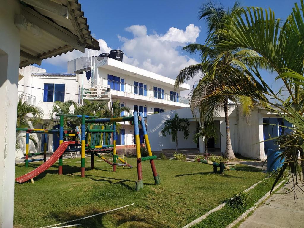 a playground in front of a building at COVEÑAS ECOREAL in Coveñas