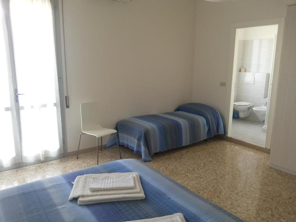 Postel nebo postele na pokoji v ubytování Hotel Canoa