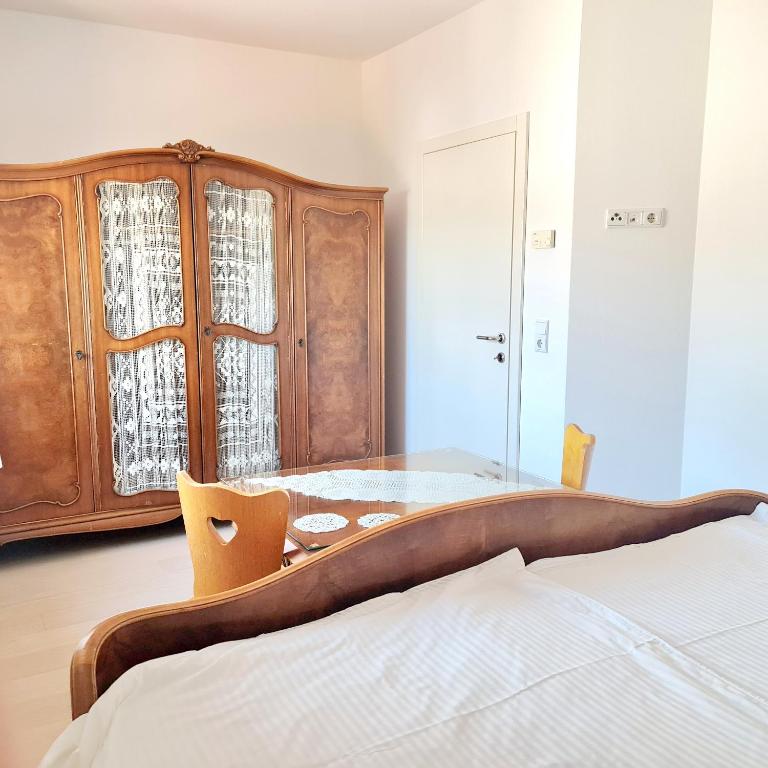 Posteľ alebo postele v izbe v ubytovaní Apartmani Val