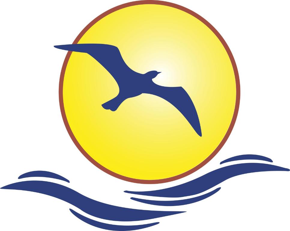 Sea Breeze Guest House في دوغلاس: رمز لطائر يطير فوق الماء