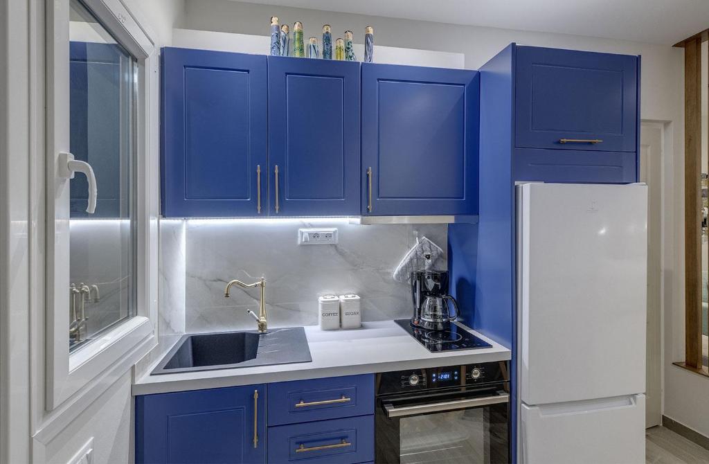Kuchyň nebo kuchyňský kout v ubytování Polis Suite