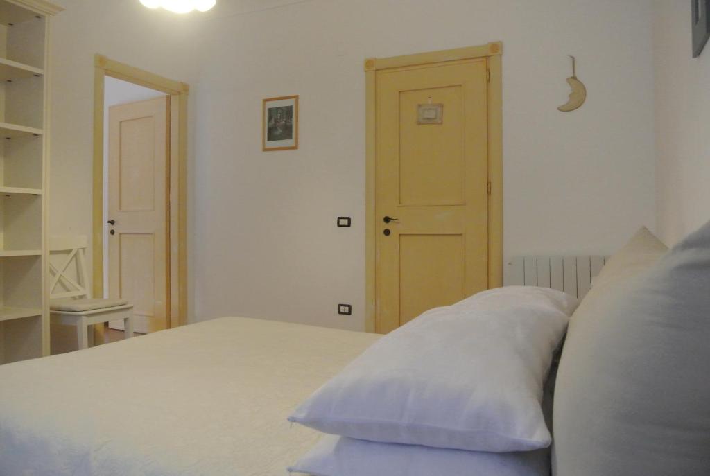 Postel nebo postele na pokoji v ubytování Villa Carlotta Resort