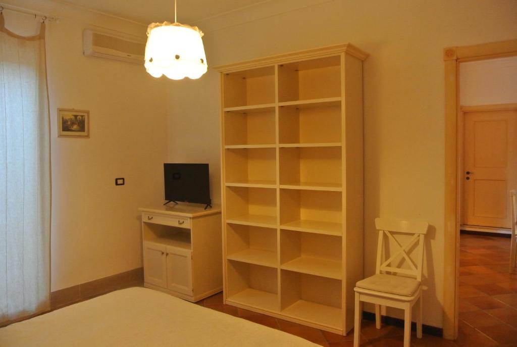 TV a/nebo společenská místnost v ubytování Villa Carlotta Resort
