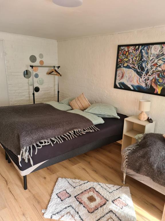 En eller flere senger på et rom på Trandafir Guesthouse