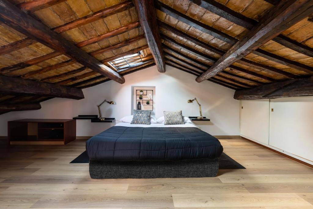 Posteľ alebo postele v izbe v ubytovaní Rooftop Campo dei Fiori